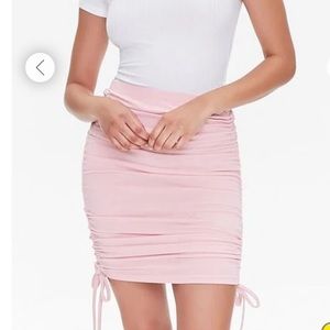 NWT pink ruched side tie skirt. Size XS